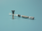 Sensor holder in use in vial and syringe